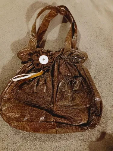Bolsa de plástico marrom nunca usada M