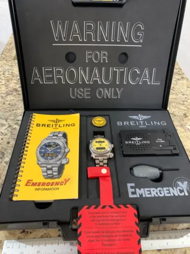 Breitling Emergency Titanium 43mm maleta e todos acessórios