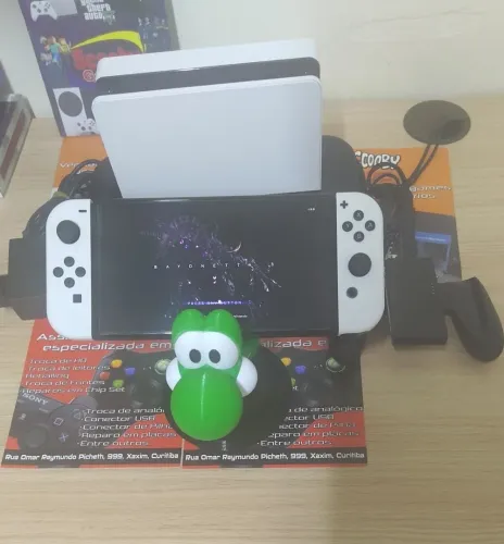 NINTENDO SWITCH OLED DESTRAVADO, COM JOGOS, GARANTIA 1 ANO, LOJA