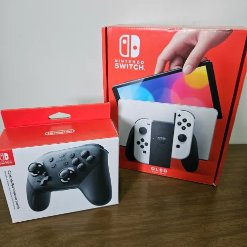 Nintendo Switch Oled + Pro Controller + jogo digital. Na caixa, com nota fiscal. 