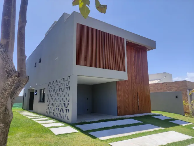 Casa Moderna com 4 Suítes, Piscina e Pé Direito Duplo Elegância e Conforto em Cada Detalh