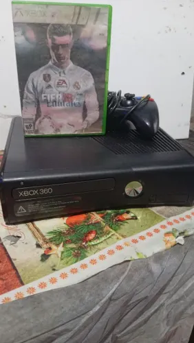 Incluí HD externo com 40 jogos e duas mídias física e um controle gueime bloqueado 