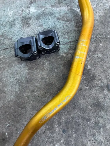 Guidão oxxy dourado