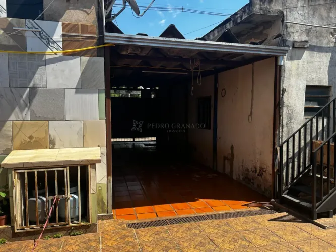 Salas comerciais e mais uma casa no Jd. Tupinambá.