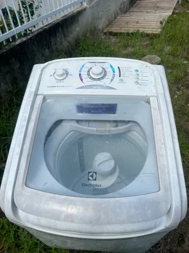 Máquina de lavar com defeito