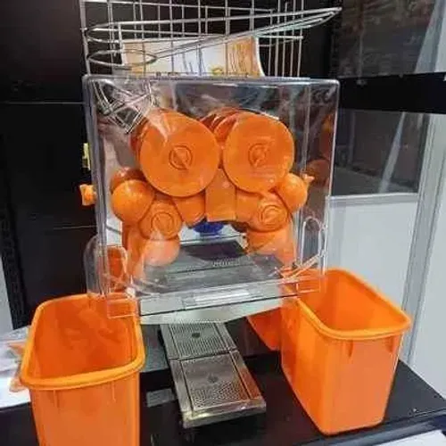 Máquina de suco espremedor automático de laranjas - Marcos