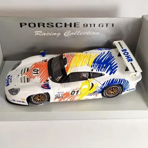 MINIATURA UT MODELS PORSCHE 911 GT 1 número 01 - RACING COLLECTION, na caixa original. Min