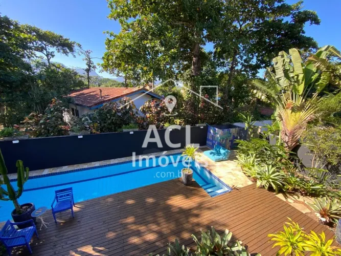 Casa em condomínio pé na areia em Maresias
