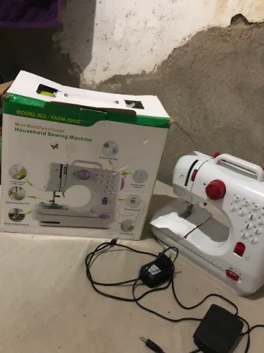 Maquina de costura portatil
