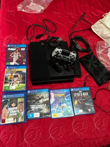 PS4 console com controle e 6 jogos