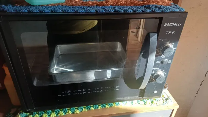 Vendo esse forno 60 litros praticamente novo usado apenas 2 vezes