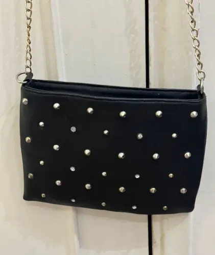 Bolsa brilhos e spikes