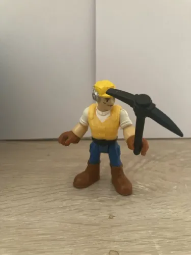 bonequinho imaginext com acessório