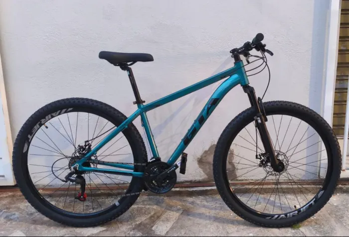 Bicicleta GTA 29 start Azul Esmeralda 21v TM17 Freios a disco Cabeamento Interno