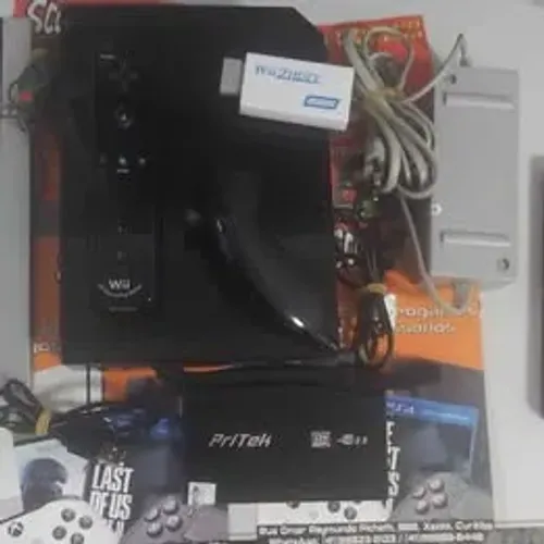 NINTENDO WII DESTRAVADO SEMINOVO PRETO,1 PAR DE CONTROLE,HD EXTERNO COM 200 JOGOS
