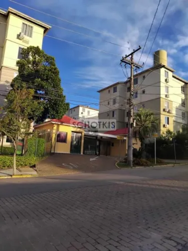IMOBILIÁRIA SCHOTKIS VENDE EXCELENTE APARTAMENTO DE 02 DORMITÓRIOS TÉRREO COM SOL DA MANHÃ