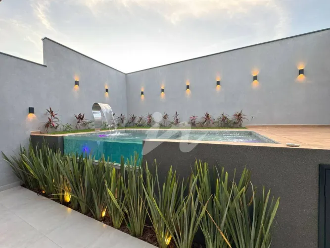 Casa com 3 dormitórios à venda, 203 m² por R$ 1.950.000,00 - Condomínio Terras Alpha - Gra