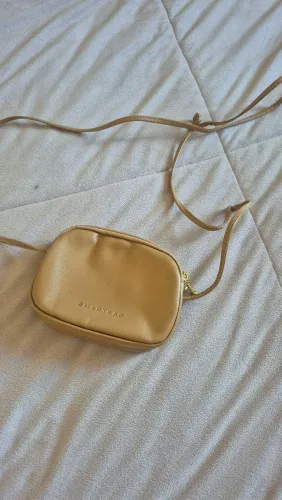 Bolsinha couro (pouco usada)
