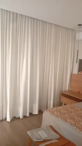 Instalador de papel de parede e cortinas