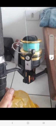 Molinete daiwa bg60 impecável 