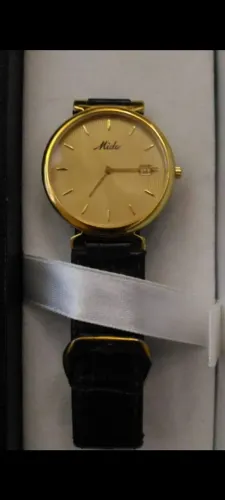 Relógio Mido Dourado