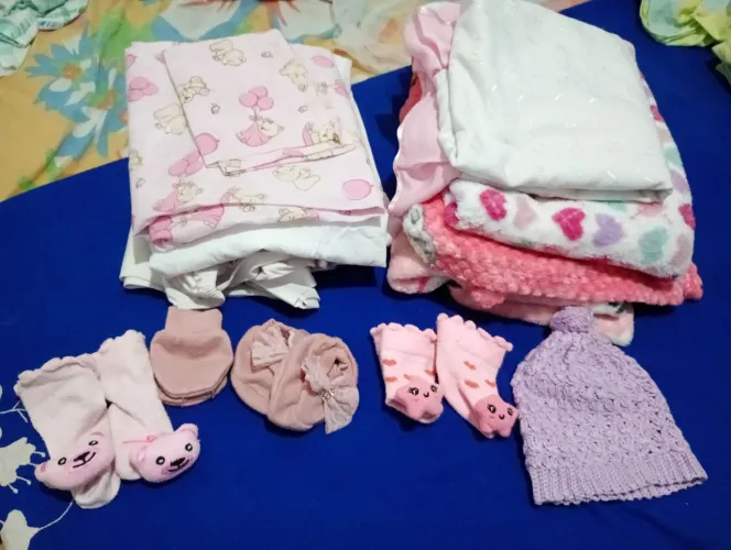 Enxoval de bebê para menina.