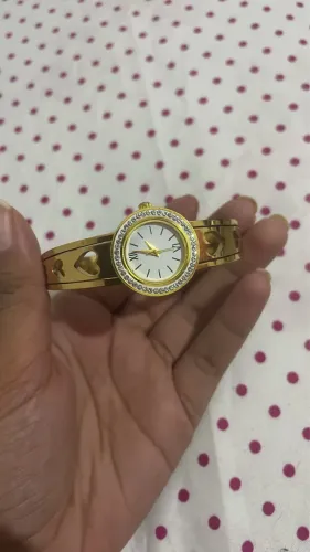 Relógio dourado aço inoxidável