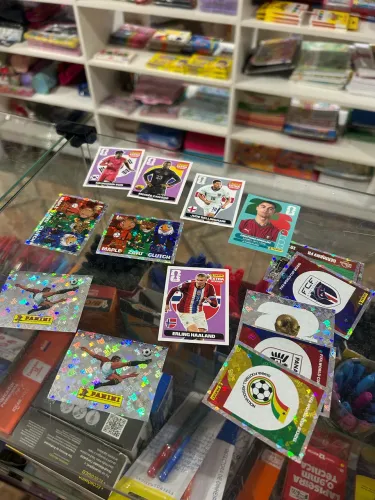 Álbum e figurinhas