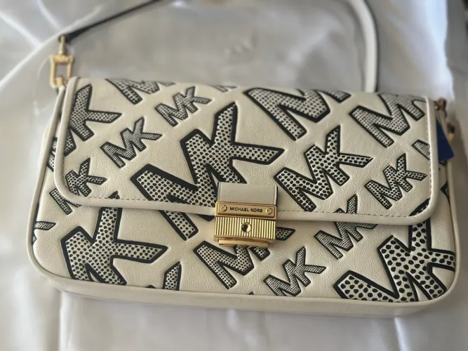 Bolsa da Michael Kors NOVA original R$ 999,99OBS: está com etiqueta ?