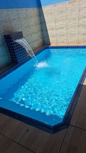 VENDO OU TROCO POR CARRO CASA COM PISCINA 