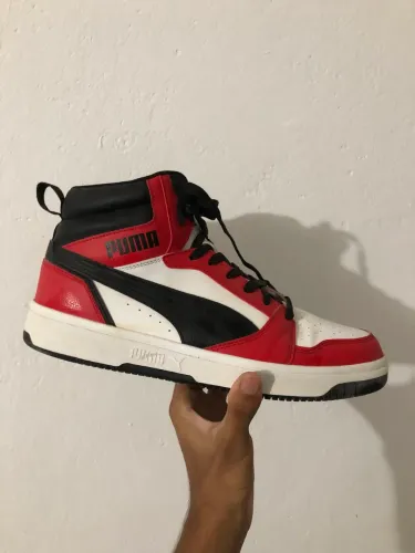 Tênis Puma cano alto Rebound joy