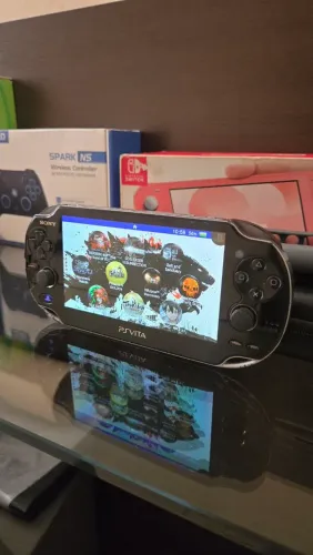 Psvita desbloqueado 128gb completo lotado de jogos, +carregador de otima qualidade!!