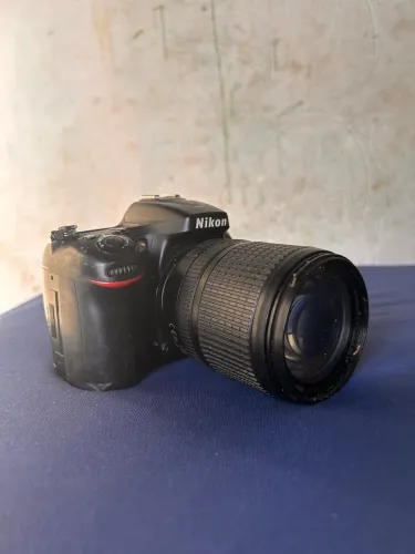 NIKON D7100 + LENTE 18-140mm