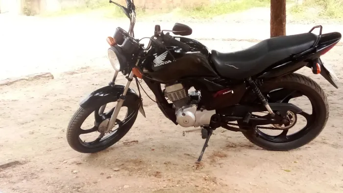 Vendo fan 125 ano 2012 IPVA 2026 já pago no ponto de transferir 