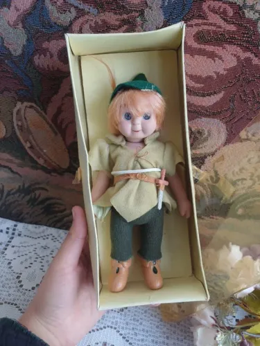 Boneco Peter Pan de porcelana Planeta D' Agostine