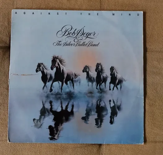 LP disco vinil Bob Seger & The Silver Bullet Band Against The Wind toca disco radiola som<br>