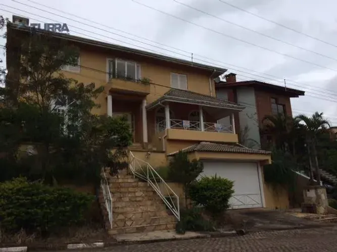 Casa com 4 dormitórios de 452 m² á venda ou aluguel no Condominio Parque das Garças II em