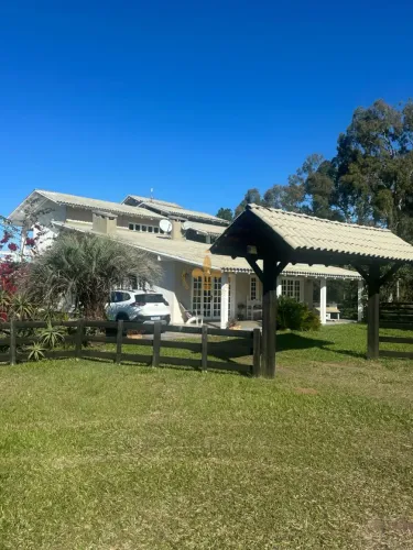 Casa com 5 Dormitorio(s) localizado(a) no bairro Itapeva em Torres / Ref.:133
