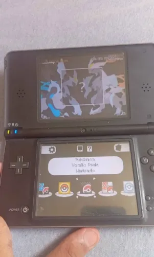 Nintendo dsi xl usado com bateria viciada facilmente trocada