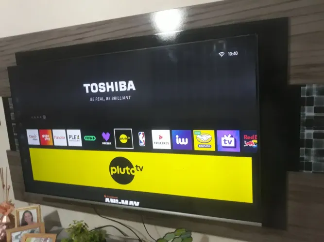 tv 55 smart 4k Toshiba bordas infinitas controle voz entrego *