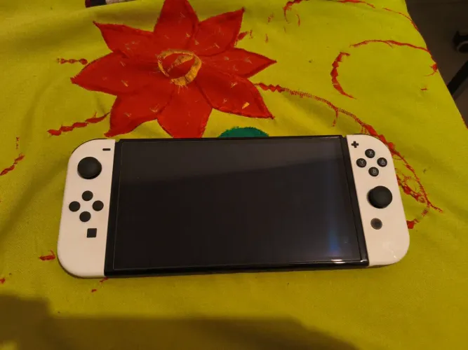 Nintendo switch oled desbloqueado 128gb completo