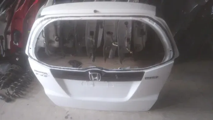 Honda fit ano 2012 tampa traseira