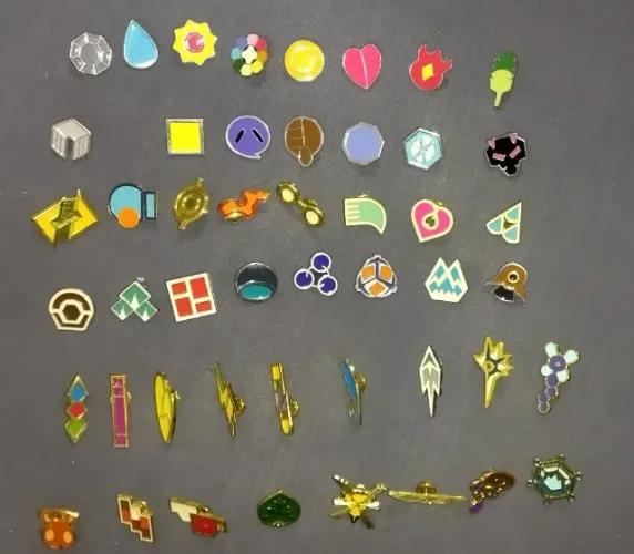 56 Insígnias (pins) Pokemon - colecionador