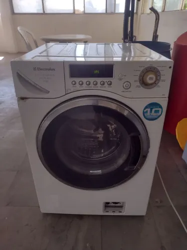 Máquina lavar: lava e seca 9 kg( com defeito H4)