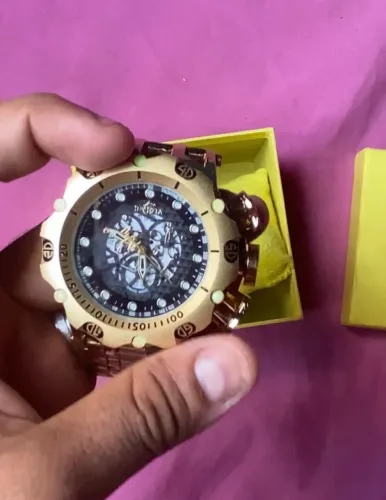 Vende-se este relógio invicta moeda antiga 