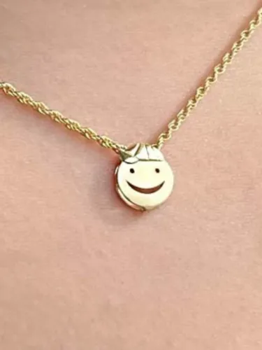Pingente em ouro 18k menina e menino.