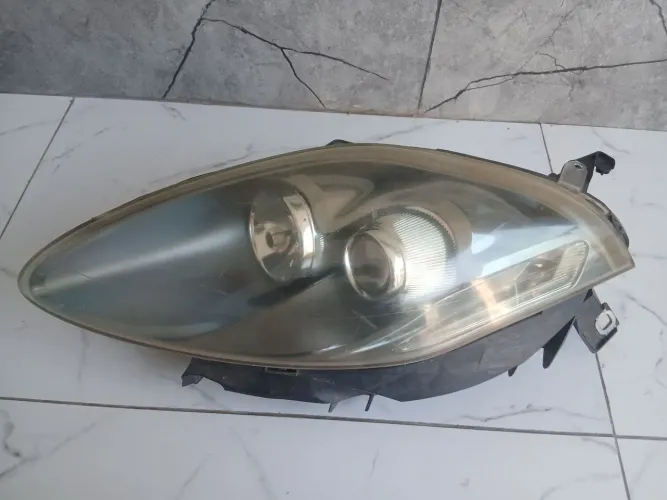 Farol Fiat bravo lado esquerdo original
