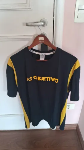 Camiseta Objetivo tam X2G unid Paz 