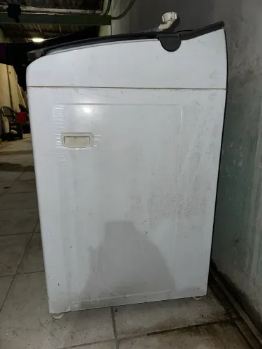 Máquina de lavar com defeito