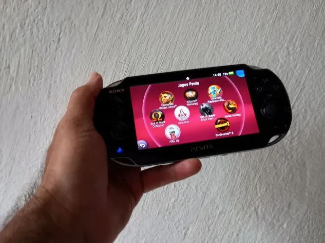 Ps vita OLED + acessórios venda ou troca com torna leia o anúncio